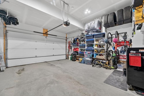 73 Fireside Cove, Cochrane, AB - Indoor Photo Showing Garage