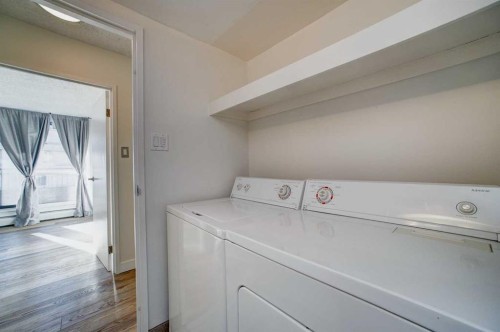 9E-133 25 Avenue Sw, Calgary, AB - Indoor Photo Showing Laundry Room