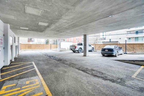 9E-133 25 Avenue Sw, Calgary, AB - Indoor Photo Showing Garage