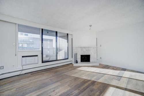 9E-133 25 Avenue Sw, Calgary, AB - Indoor With Fireplace