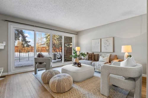 3-2212 Paliswood Road Sw, Calgary, AB - Indoor Photo Showing Living Room