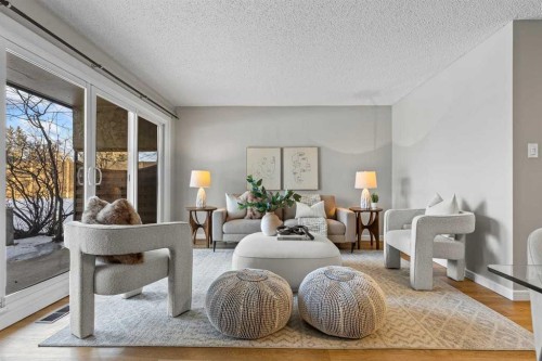 3-2212 Paliswood Road Sw, Calgary, AB - Indoor Photo Showing Living Room