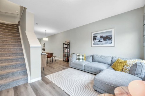 207-850 Belmont Drive Sw, Calgary, AB - Indoor Photo Showing Living Room
