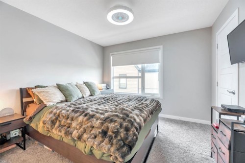 207-850 Belmont Drive Sw, Calgary, AB - Indoor Photo Showing Bedroom