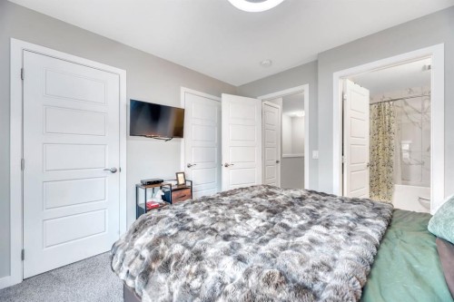 207-850 Belmont Drive Sw, Calgary, AB - Indoor Photo Showing Bedroom