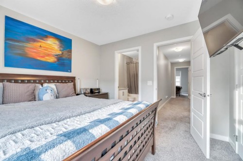 207-850 Belmont Drive Sw, Calgary, AB - Indoor Photo Showing Bedroom