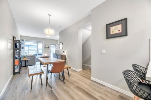 207-850 Belmont Drive Sw, Calgary, AB - Indoor Photo Showing Dining Room