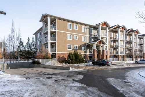 306-406 Cranberry Park Se, Calgary, AB - Outdoor With Balcony With Facade