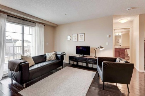 306-406 Cranberry Park Se, Calgary, AB - Indoor Photo Showing Living Room