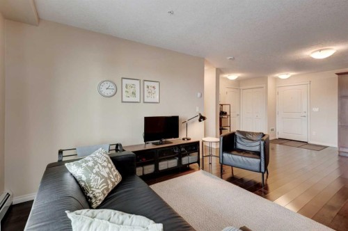 306-406 Cranberry Park Se, Calgary, AB - Indoor Photo Showing Living Room