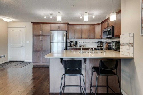 306-406 Cranberry Park Se, Calgary, AB - Indoor Photo Showing Kitchen