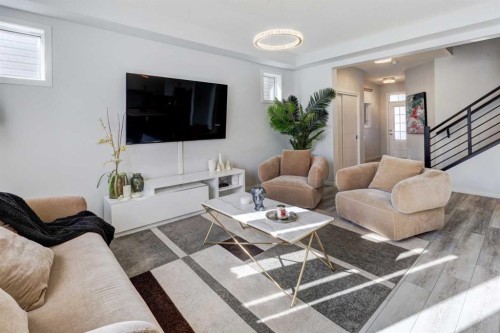 785 Windrow Manor Sw, Airdrie, AB - Indoor Photo Showing Living Room