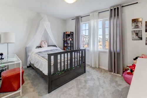 785 Windrow Manor Sw, Airdrie, AB - Indoor Photo Showing Bedroom