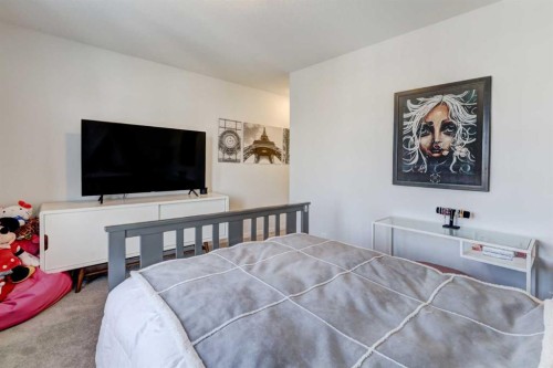 785 Windrow Manor Sw, Airdrie, AB - Indoor Photo Showing Bedroom