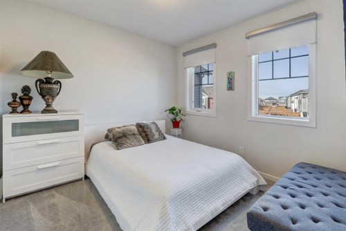 785 Windrow Manor Sw, Airdrie, AB - Indoor Photo Showing Bedroom