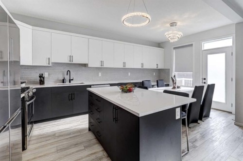 785 Windrow Manor Sw, Airdrie, AB - Indoor Photo Showing Kitchen With Upgraded Kitchen