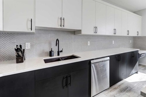 785 Windrow Manor Sw, Airdrie, AB - Indoor Photo Showing Kitchen With Double Sink