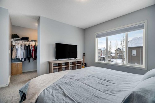 335 Copperpond Row Se, Calgary, AB - Indoor Photo Showing Bedroom