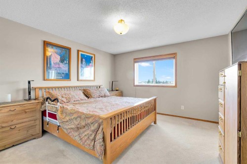 132 Saddletree Close Ne, Calgary, AB - Indoor Photo Showing Bedroom