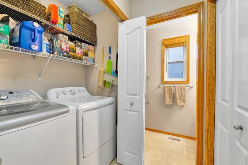132 Saddletree Close Ne, Calgary, AB - Indoor Photo Showing Laundry Room