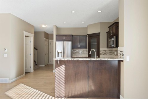 328 Silverado Plains Circle Sw, Calgary, AB - Indoor Photo Showing Kitchen With Upgraded Kitchen