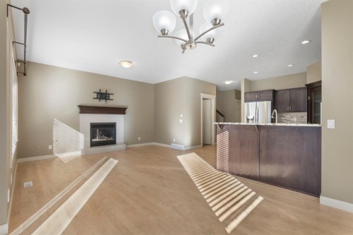 328 Silverado Plains Circle Sw, Calgary, AB - Indoor With Fireplace