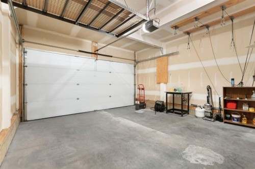 328 Silverado Plains Circle Sw, Calgary, AB - Indoor Photo Showing Garage