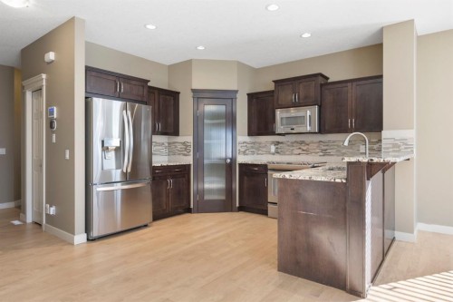 328 Silverado Plains Circle Sw, Calgary, AB - Indoor Photo Showing Kitchen With Stainless Steel Kitchen With Upgraded Kitchen