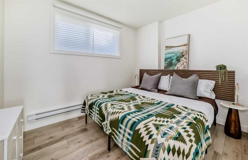 35 Spring Creek Common Sw, Calgary, AB - Indoor Photo Showing Bedroom