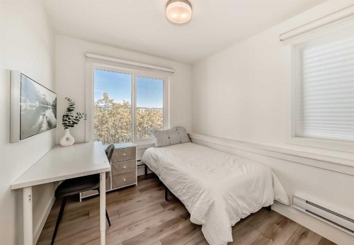 35 Spring Creek Common Sw, Calgary, AB - Indoor Photo Showing Bedroom