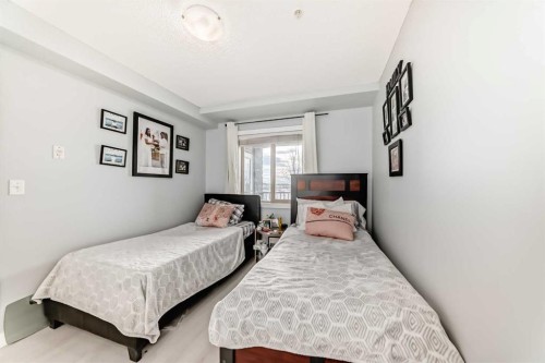 314-5 Saddlestone Way, Calgary, AB - Indoor Photo Showing Bedroom