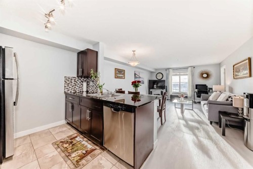 314-5 Saddlestone Way, Calgary, AB - Indoor Photo Showing Kitchen With Double Sink