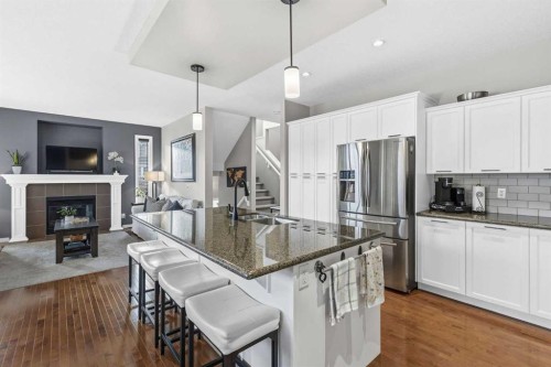 101 Evanscreek Court Nw, Calgary, AB - Indoor Photo Showing Kitchen With Double Sink With Upgraded Kitchen