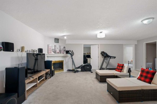 358 Hawkstone Drive Nw, Calgary, AB - Indoor Photo Showing Gym Room