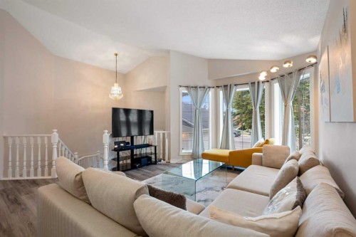 358 Hawkstone Drive Nw, Calgary, AB - Indoor Photo Showing Living Room