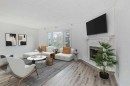 39 Bermuda Drive, Calgary, AB  - Indoor Photo Showing Living Room With Fireplace 