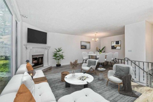 39 Bermuda Drive, Calgary, AB - Indoor Photo Showing Living Room With Fireplace