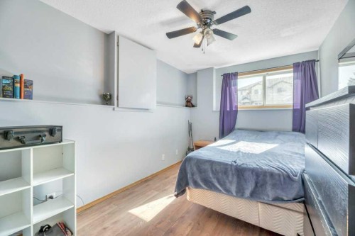 29E Wellington Cove, Strathmore, AB - Indoor Photo Showing Bedroom