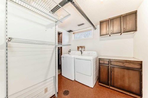 540 Dalmeny Hill Nw, Calgary, AB - Indoor Photo Showing Laundry Room