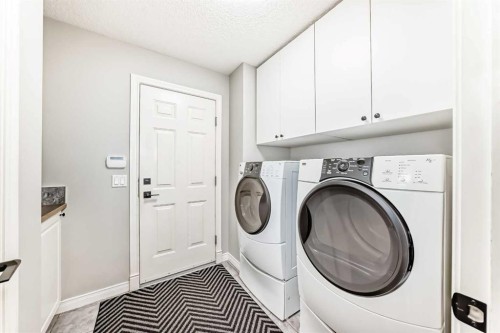 115 West Lakeview Circle, Chestermere, AB - Indoor Photo Showing Laundry Room
