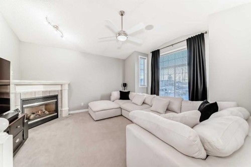 115 West Lakeview Circle, Chestermere, AB - Indoor Photo Showing Living Room With Fireplace