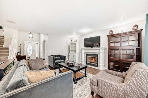 115 West Lakeview Circle, Chestermere, AB - Indoor Photo Showing Living Room With Fireplace