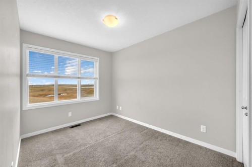 50 Copperstone Common Se, Calgary, AB - Indoor Photo Showing Other Room