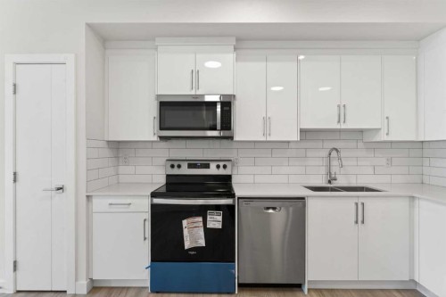 2304-15 Skyview Point Crescent Ne, Calgary, AB - Indoor Photo Showing Kitchen With Stainless Steel Kitchen With Double Sink With Upgraded Kitchen
