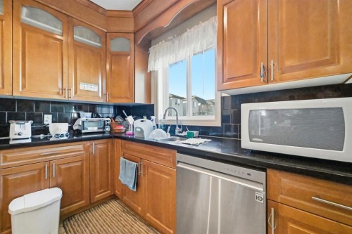 104 Taralake Common Ne, Calgary, AB - Indoor Photo Showing Kitchen With Double Sink