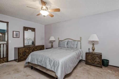 14319 Evergreen Street Sw, Calgary, AB - Indoor Photo Showing Bedroom