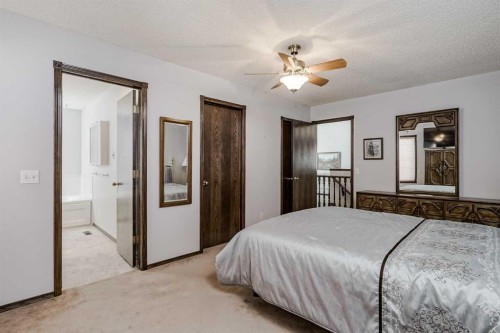 14319 Evergreen Street Sw, Calgary, AB - Indoor Photo Showing Bedroom
