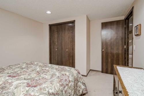 14319 Evergreen Street Sw, Calgary, AB - Indoor Photo Showing Bedroom