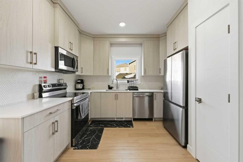 21 Cornerbrook Lane Ne, Calgary, AB - Indoor Photo Showing Kitchen With Stainless Steel Kitchen