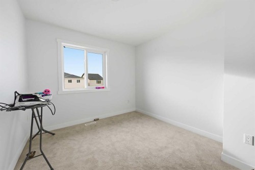 21 Cornerbrook Lane Ne, Calgary, AB - Indoor Photo Showing Other Room